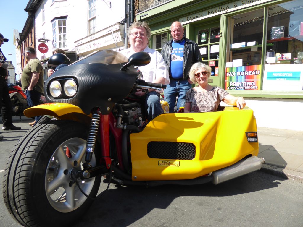 Trike and Bike Show - Friends secretary Angie Batson rides sidecar with mayor Barry Hester with bike owner Jake Silk in the background.