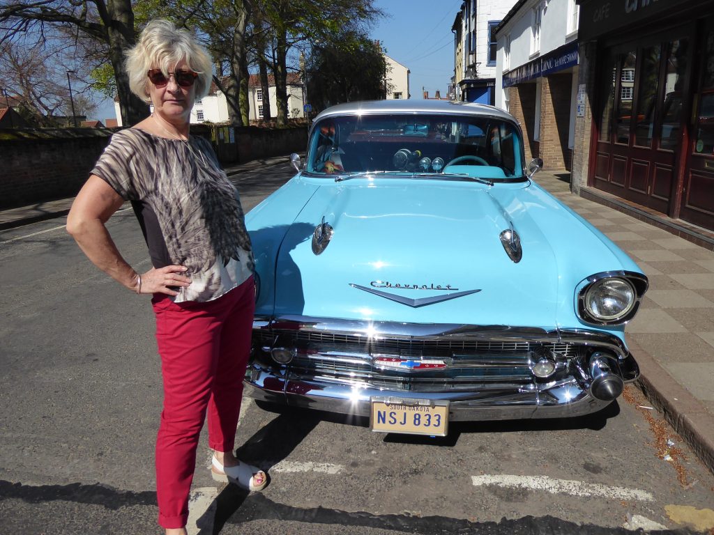 Friends secretary Angie Batson with a Chevvy at the Trike and Bike Show